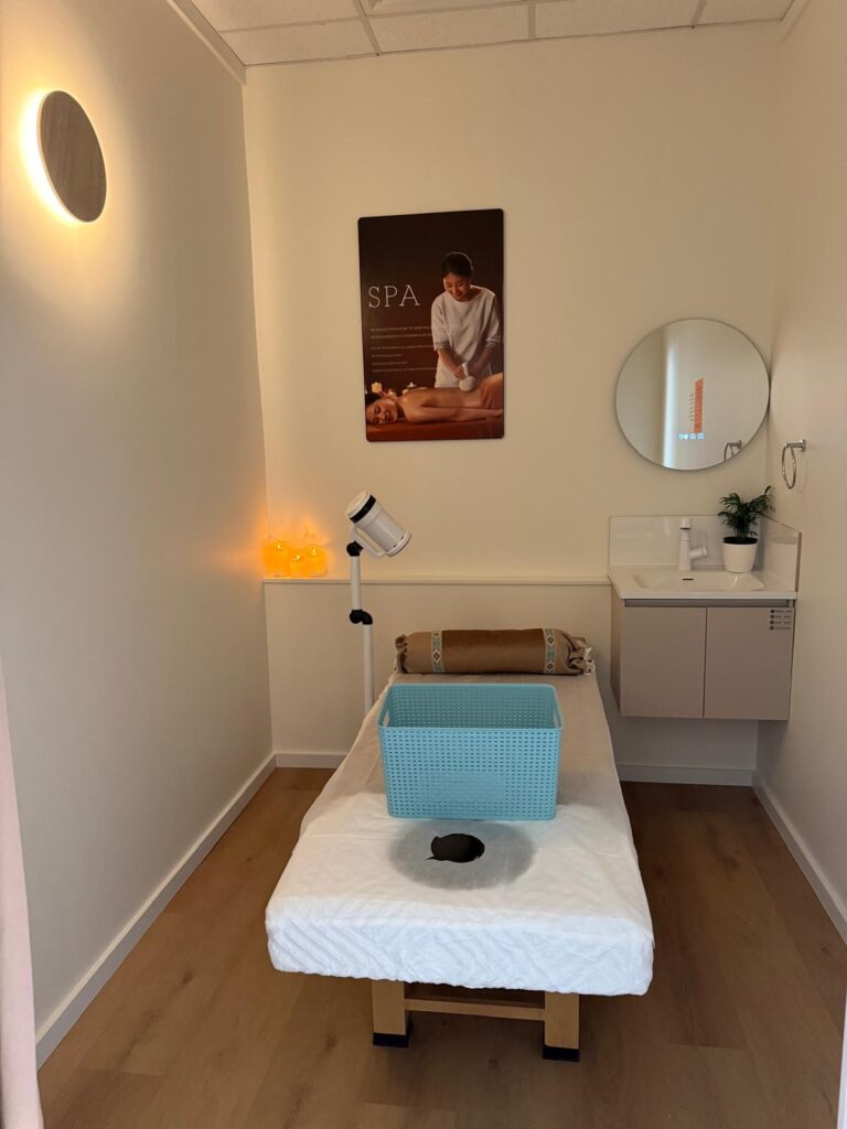 Massage room set up for a treatment at The Royal Orchid, Wyee